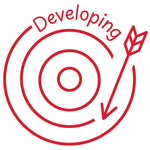 Étampe pour enseignant en anglais « Developing » avec cible et flèche en progression - encre rouge